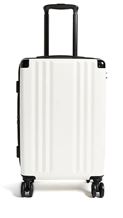 Shop Calpak Ambeur Carry On Suitcase In White