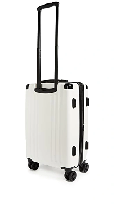 Shop Calpak Ambeur Carry On Suitcase In White