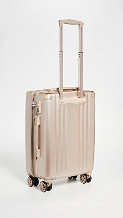 Shop Calpak Ambeur Carry On Suitcase In Yellow Gold