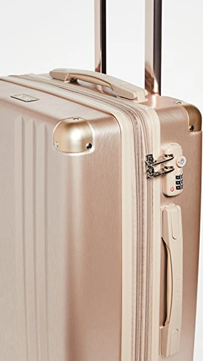 Shop Calpak Ambeur Carry On Suitcase In Yellow Gold