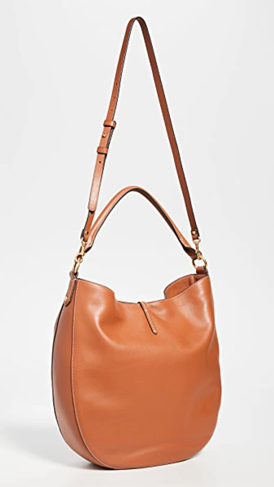 Shop Tory Burch Miller Metal Slouchy Hobo Bag In Aged Camello