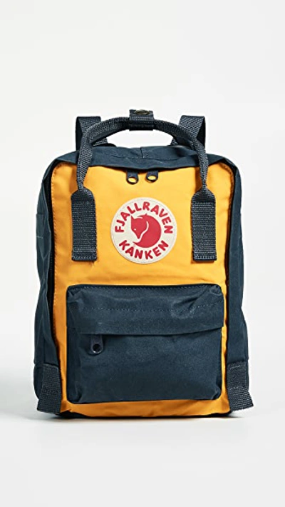 Shop Fjall Raven Kanken Mini Backpack In Navy/warm Yellow