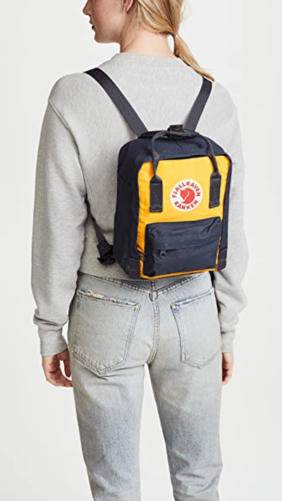 Shop Fjall Raven Kanken Mini Backpack In Navy/warm Yellow