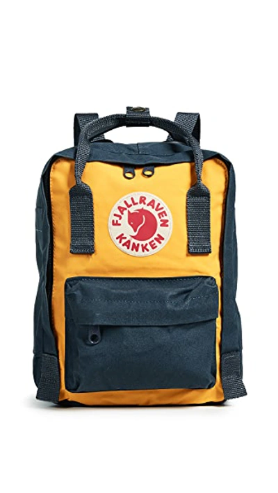 Shop Fjall Raven Kanken Mini Backpack In Navy/warm Yellow