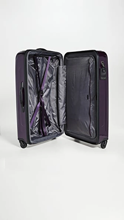 Shop Tumi Extended Trip Expandable 4 Wheeled Packing Case In Blackberry