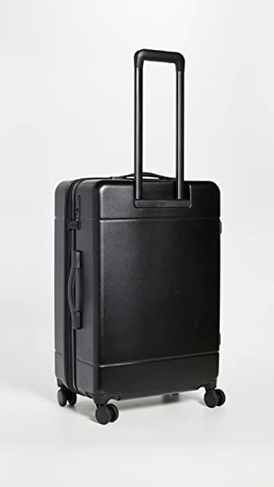 Shop Calpak 24" Medium Suitcase In Black