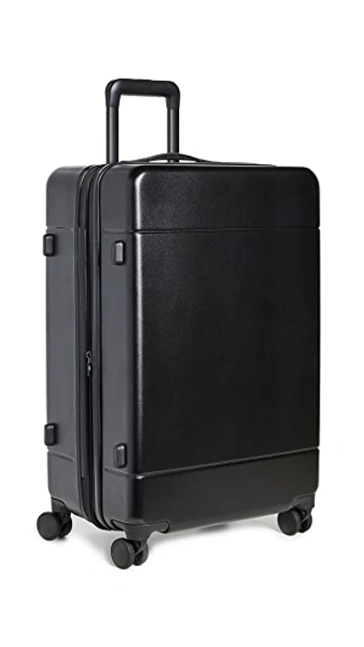 Shop Calpak 24" Medium Suitcase In Black