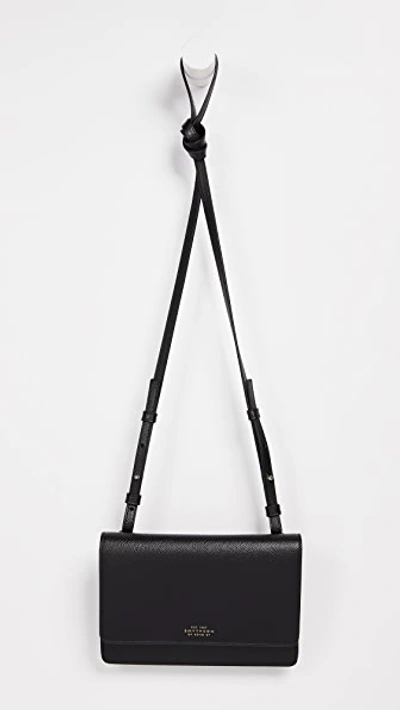 Shop Smythson Panama Purse With Strap In Black