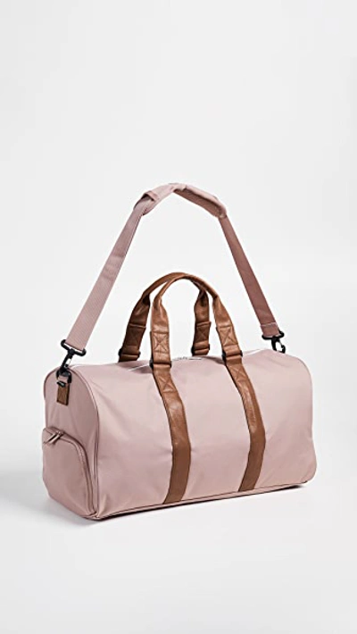 Shop Herschel Supply Co. Novel Mid-volume Duffle In Ash Rose/tan