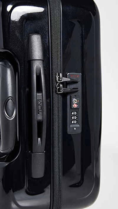 Shop Tumi V4 Carry On Suitcase In Black