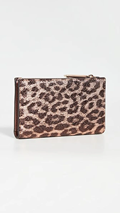 Shop Kate Spade Metallic Leopard Slim Bifold Wallet In Rose Gold Multi