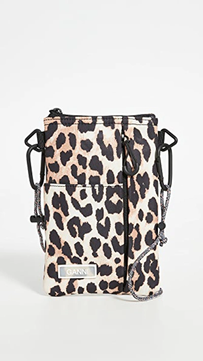 Shop Ganni Multi Pocket Crossbody Bag In Leopard