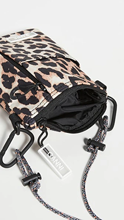 Shop Ganni Multi Pocket Crossbody Bag In Leopard