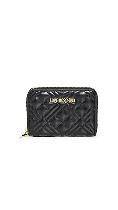 Shop Moschino Quilted Wallet In Black