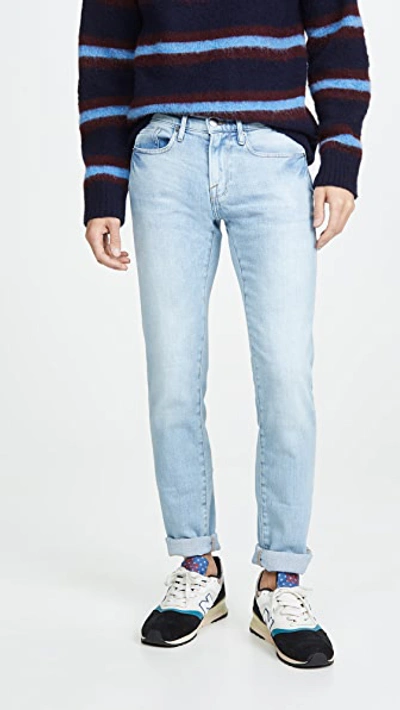 Shop Frame L'homme Slim Jeans Finn