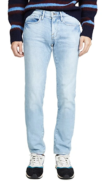 Shop Frame L'homme Slim Jeans Finn