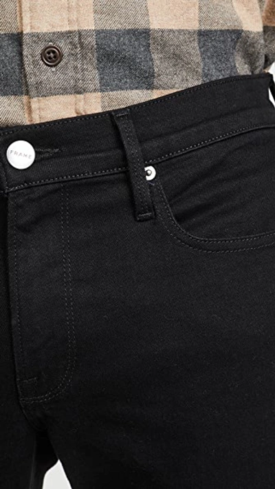 Shop Frame L'homme Slim Denim Jeans In Noir Wash Noir
