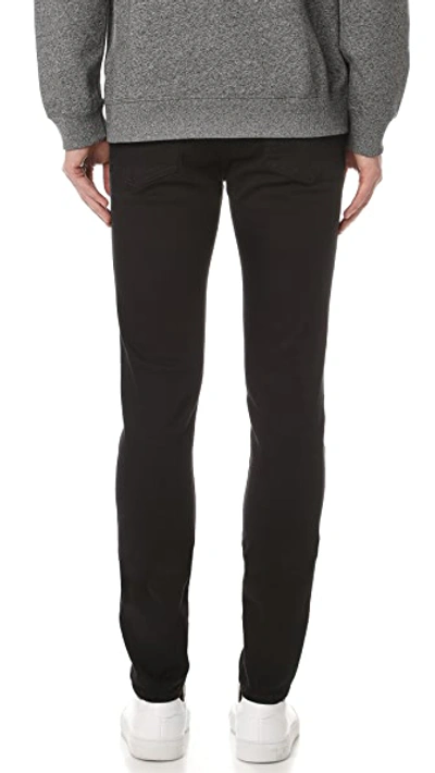 Frame L'homme Skinny Denim Jeans Noir In Noir