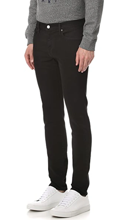 Frame L'homme Skinny Denim Jeans Noir In Noir