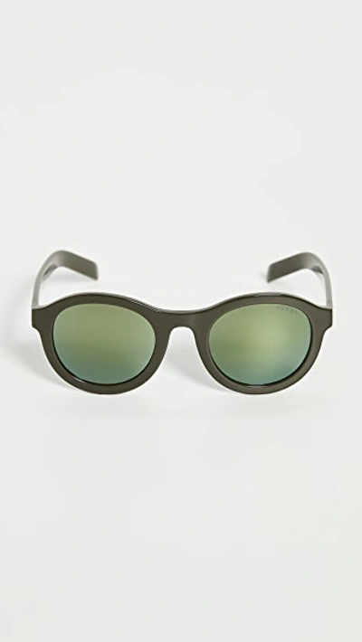 Shop Prada Round Sunglasses In Green/green Mirror