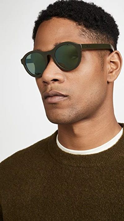 Shop Prada Round Sunglasses In Green/green Mirror