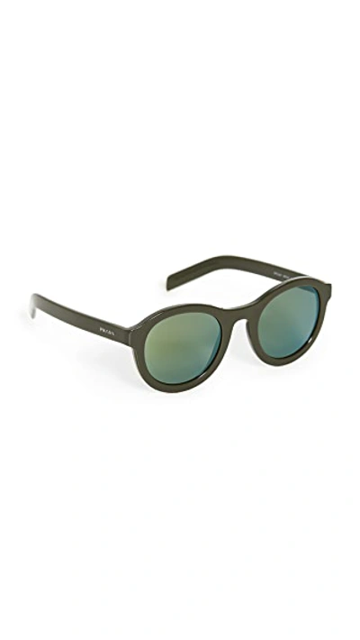 Shop Prada Round Sunglasses In Green/green Mirror