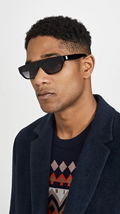 Shop Burberry Bow Sunglasses In Black/grey Gradient