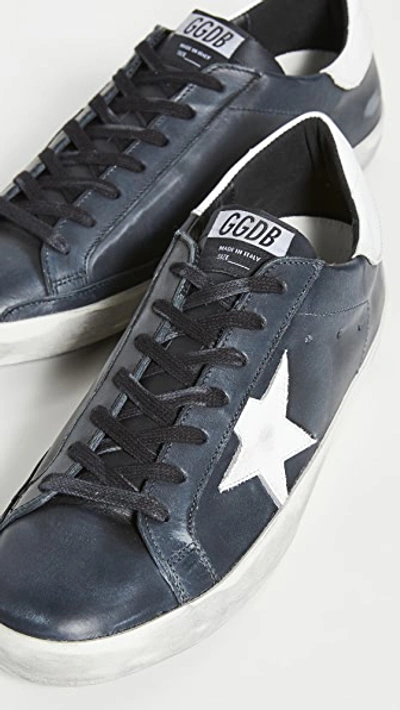 Shop Golden Goose Superstar Sneakers In Black/white Star