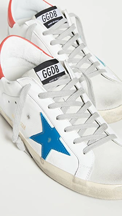 Shop Golden Goose Superstar Sneakers In White/blue Star/red