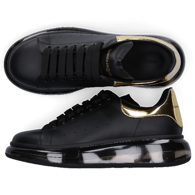 Shop Alexander Mcqueen Low-top Sneakers Larry In Gold