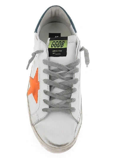 Shop Golden Goose Deluxe Brand Superstar Distressed Sneakers In White