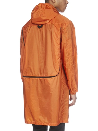 Shop Prada Logo Plaque Raincoat In Orange