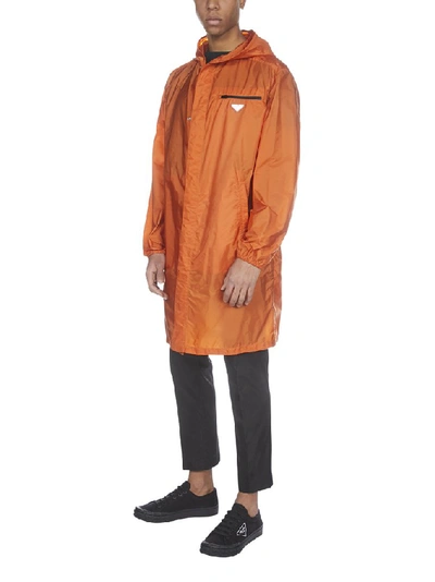 Shop Prada Logo Plaque Raincoat In Orange