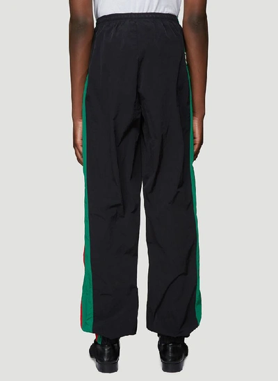 Shop Gucci Contrasting Panelled Jogging Pants In Black