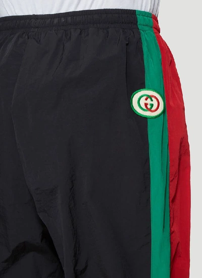 Shop Gucci Contrasting Panelled Jogging Pants In Black