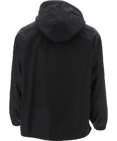 Shop Prada Hooded Windbreaker Jacket In Black