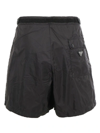 Shop Prada Logo Plaque Swim Shorts In Black