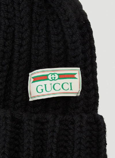 Shop Gucci Logo Patch Pom Pom Beanie In Black