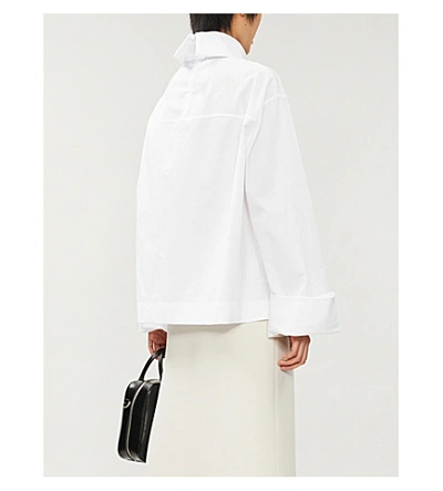 Shop The Row Mayomi Oversized Turtleneck Cotton Blouse In White