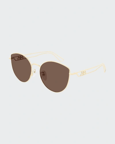 Shop Balenciaga Metal Cat-eye Sunglasses In Gold