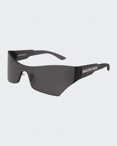 Shop Balenciaga Mirrored Rimless Wrap Sunglasses In Gray