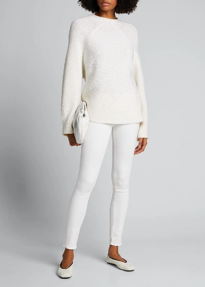 Shop Frame Le Color Mid-rise Skinny Jeans In White