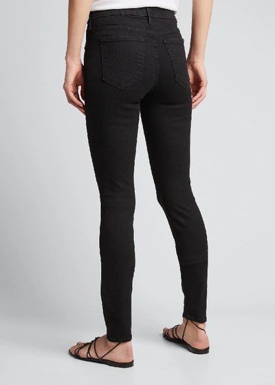 Shop Mother The Looker Skinny Ankle Jeans In Black