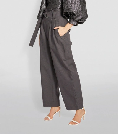 Shop Ganni Belted Paperbag-waist Trousers