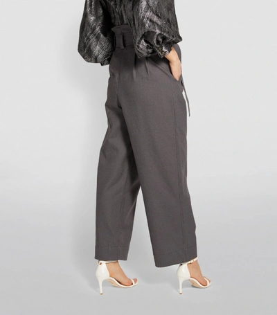 Shop Ganni Belted Paperbag-waist Trousers