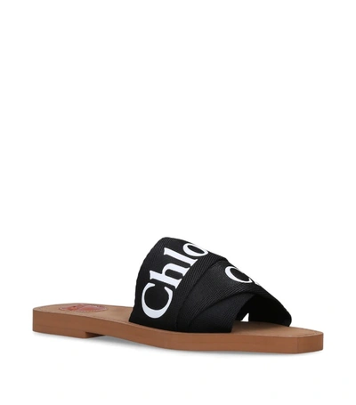 Shop Chloé Woody Logo Slides In Black