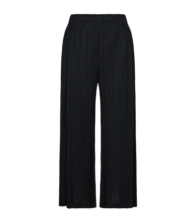 Shop Issey Miyake Wide-leg Plissé Trousers