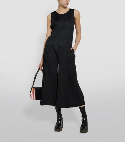 Shop Issey Miyake Wide-leg Plissé Trousers