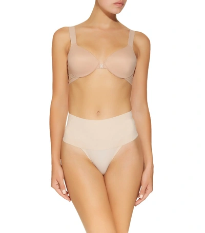 Shop Spanx Undie-tectable Thong In Nude