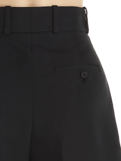 Shop Alexander Mcqueen Cropped Pants In Black